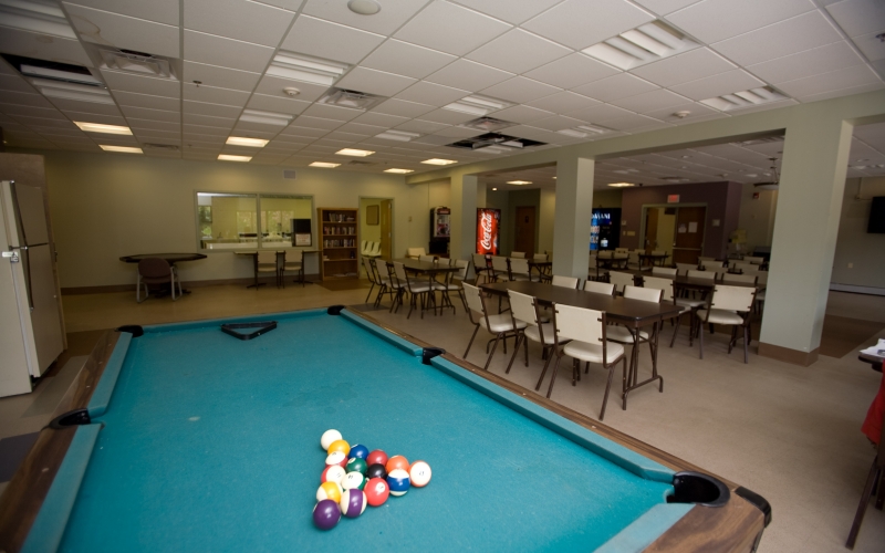 Hillcrest Village common room and pool table
